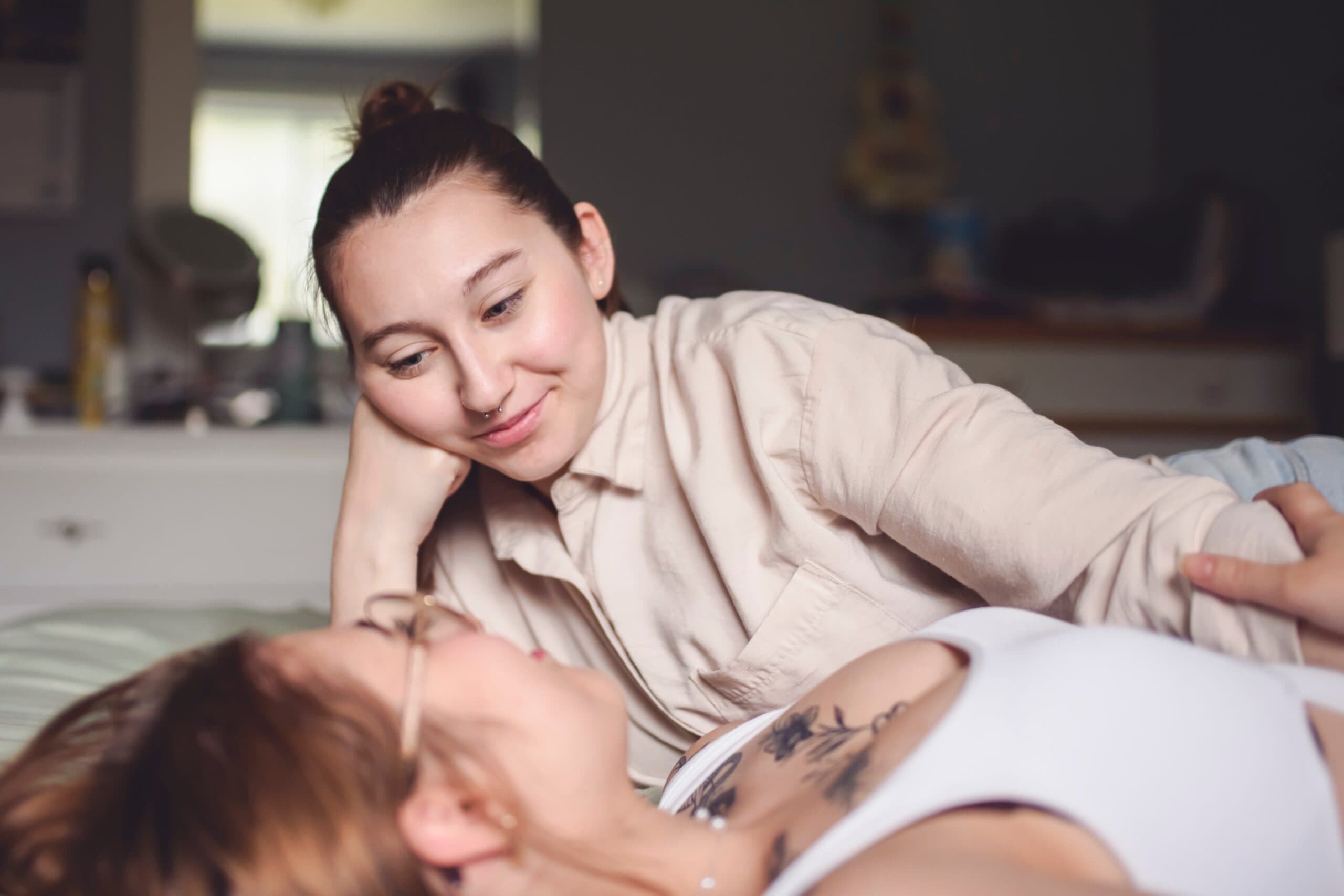 A,Happy,Couple,Cuddling,On,Their,Bed,At,Home.,Romantic